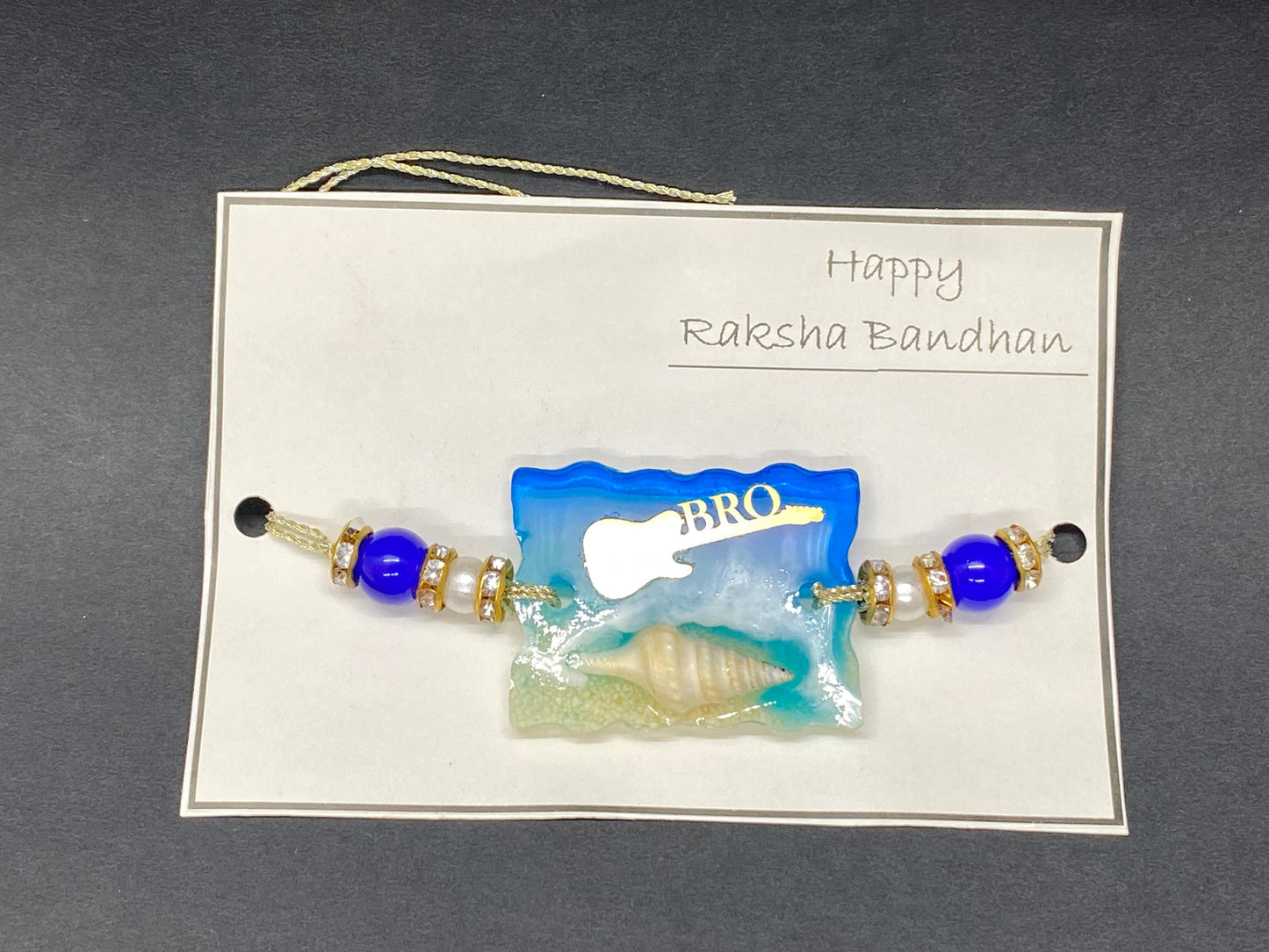 Resin Rakhi O-5